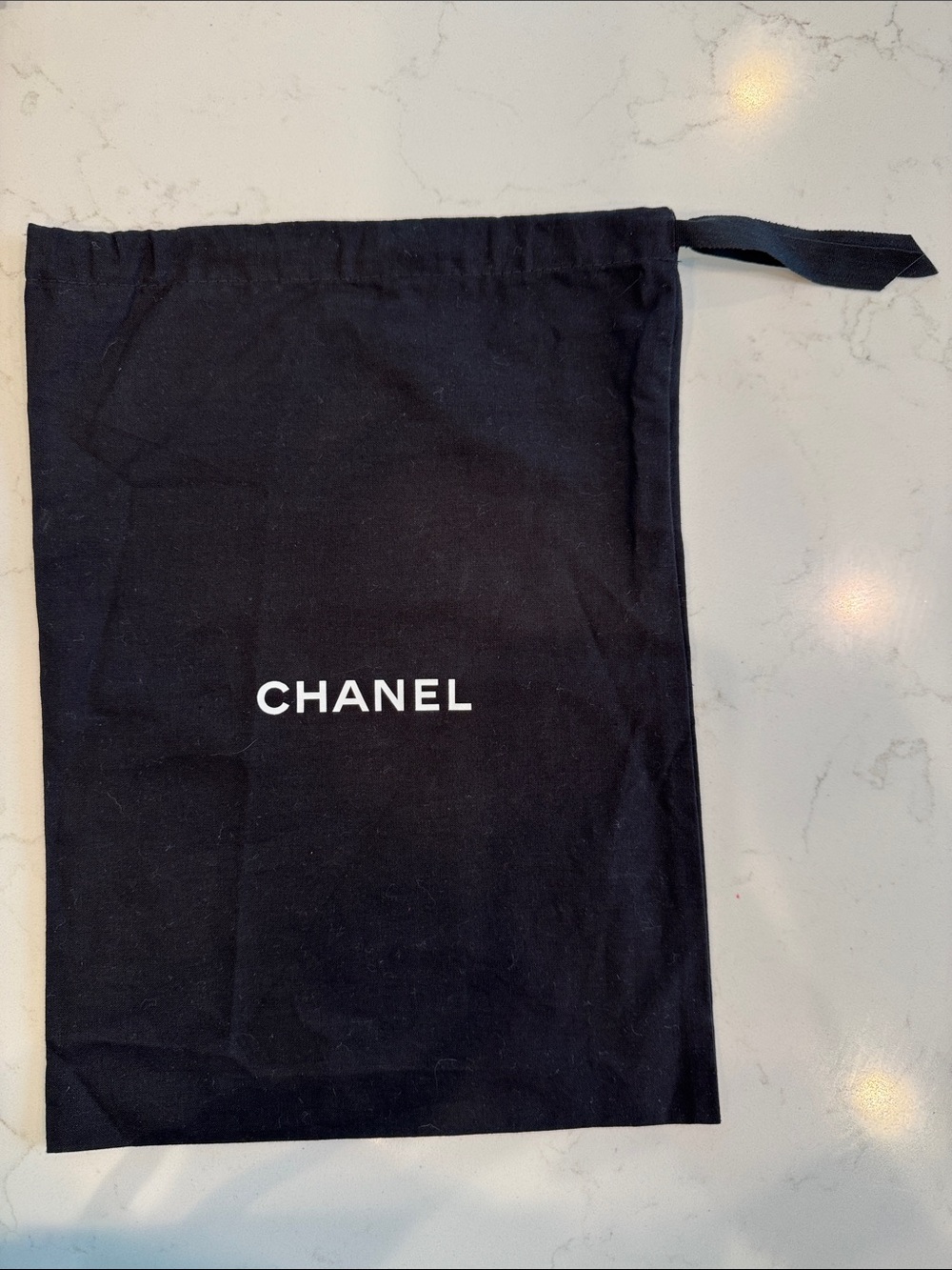 CHANEL Black Drawstring Dust Pouch with White Logo